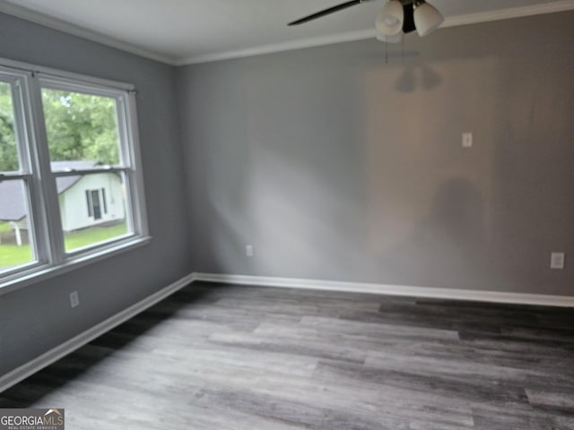 unfurnished room with ornamental molding, hardwood / wood-style floors, and ceiling fan