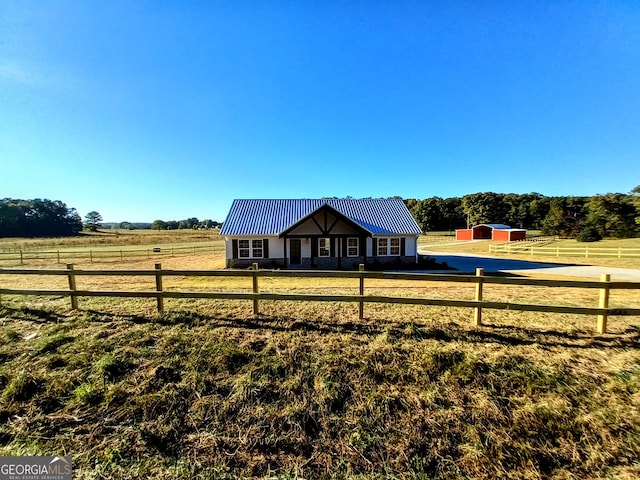 exterior space featuring a rural view