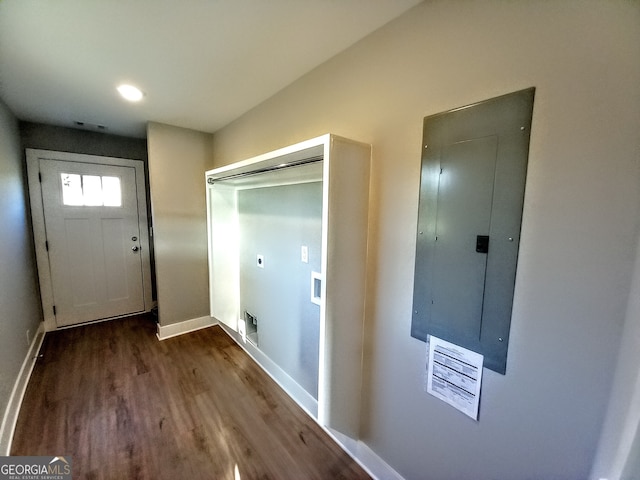 laundry area with electric panel, hookup for an electric dryer, and dark hardwood / wood-style floors