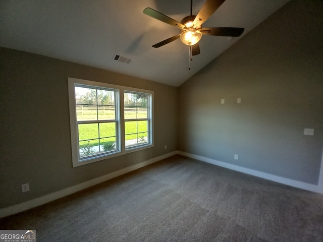 carpeted empty room with lofted ceiling and ceiling fan