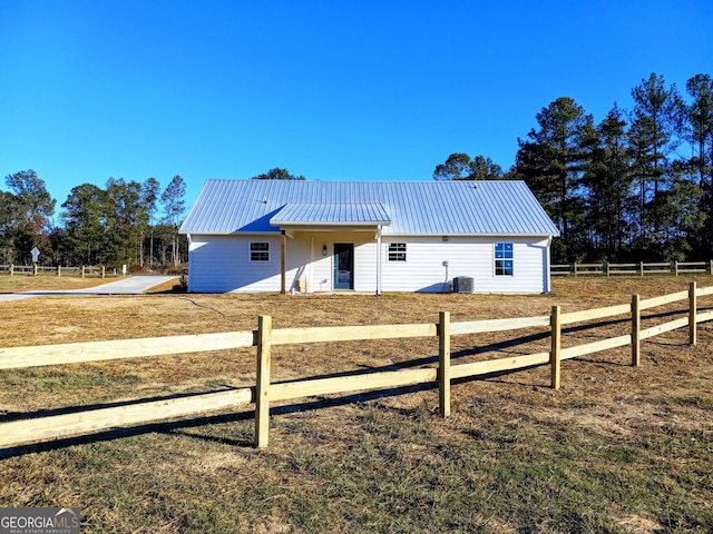 view of front of house with central air condition unit