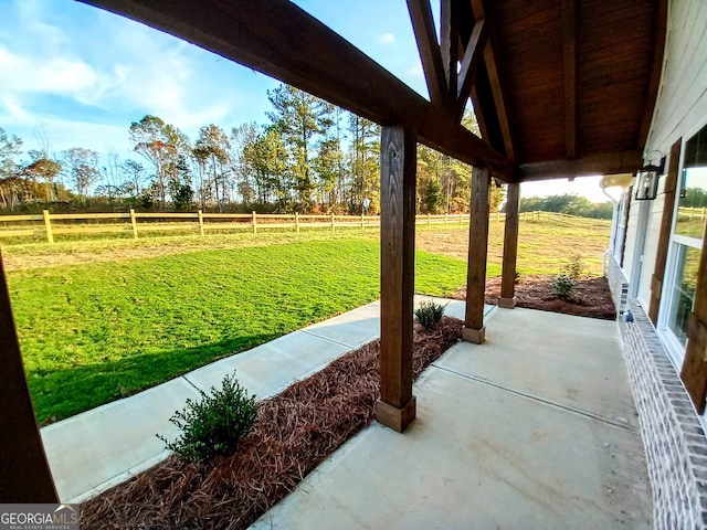 view of patio with a rural view