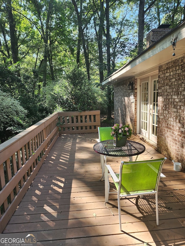 wooden terrace with french doors