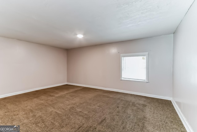 empty room featuring carpet