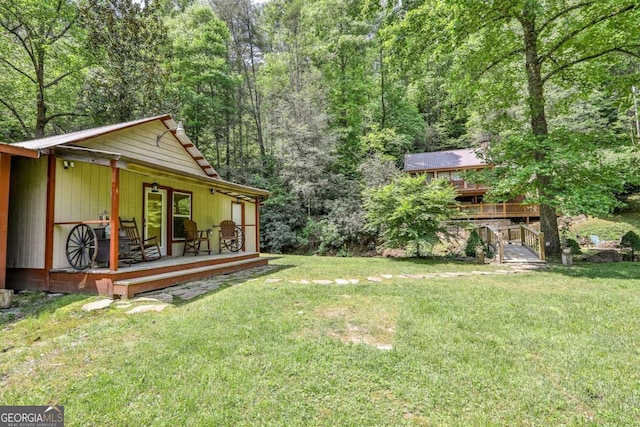 view of yard featuring a deck