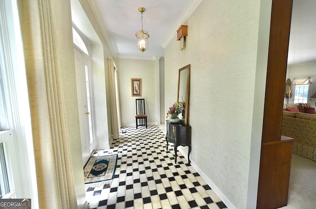 corridor featuring ornamental molding and tile patterned floors