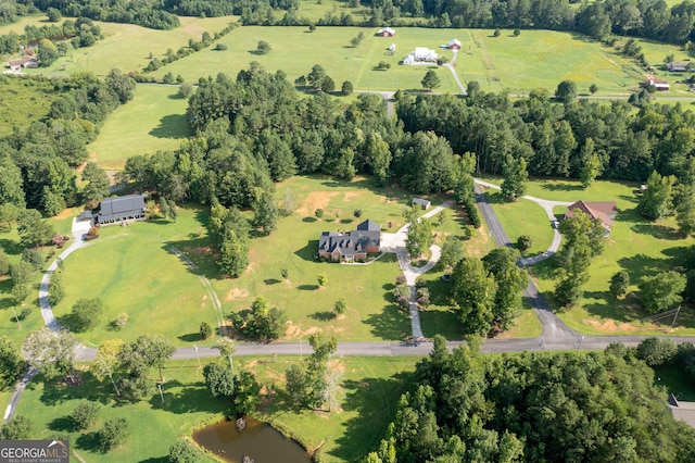 aerial view with a water view and a rural view