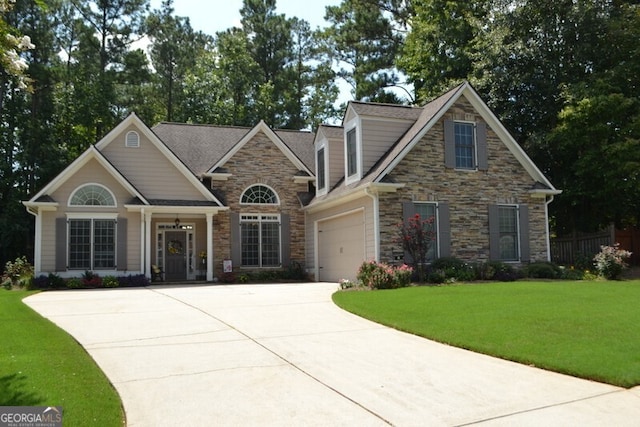 view of front facade with a front lawn and a garage