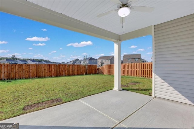 view of patio with ceiling fan