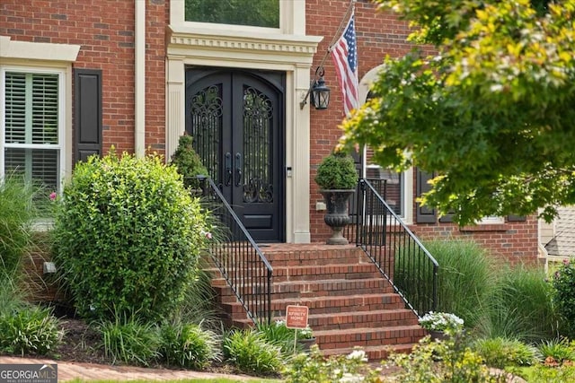 doorway to property featuring french doors