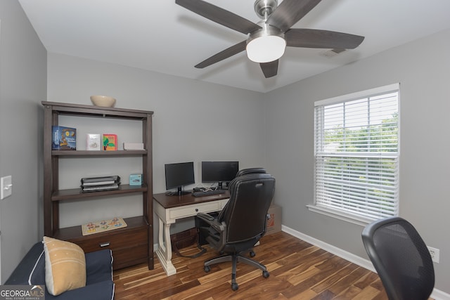 office space featuring dark wood-type flooring and ceiling fan