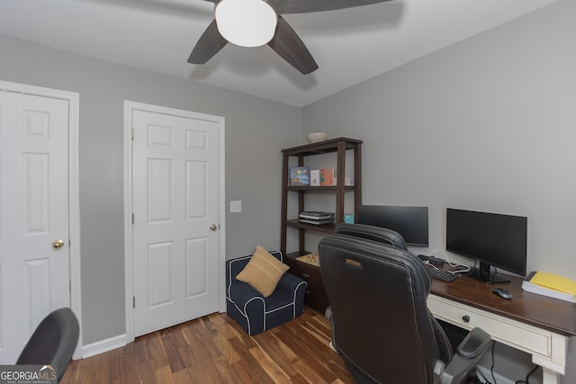 home office with ceiling fan and hardwood / wood-style floors