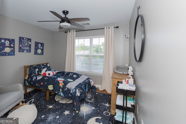 bedroom featuring ceiling fan