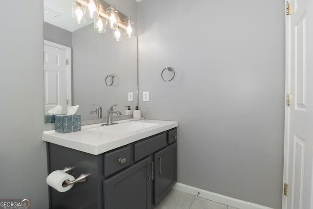 bathroom with vanity and tile patterned flooring