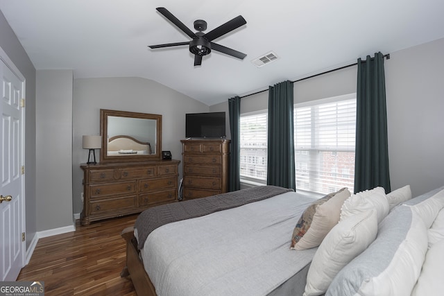 bedroom featuring dark wood-type flooring, ceiling fan, and lofted ceiling