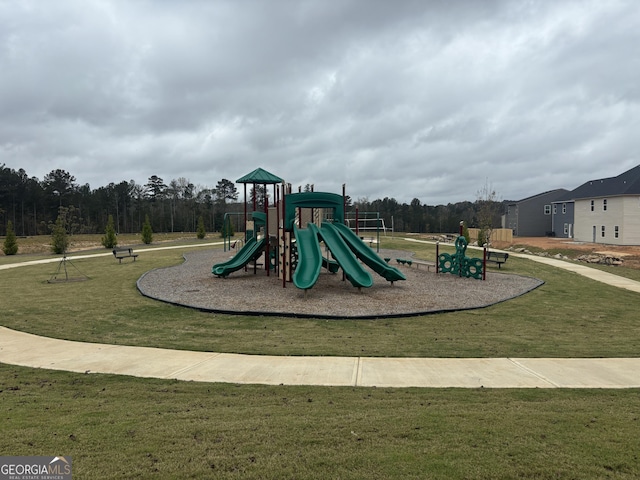 view of jungle gym with a yard