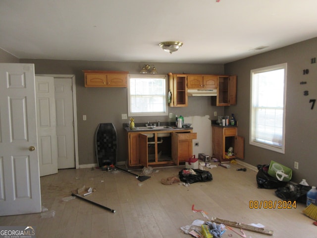 kitchen with light wood-type flooring