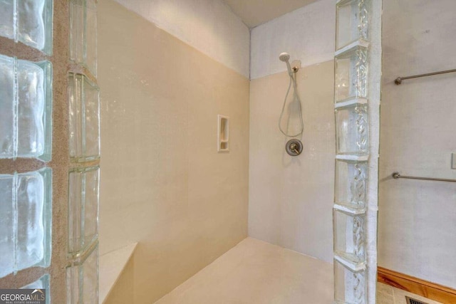 bathroom featuring a shower