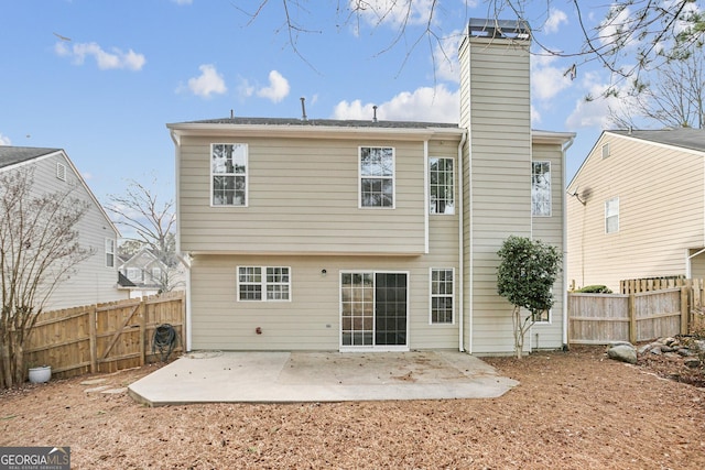 rear view of house featuring a patio area