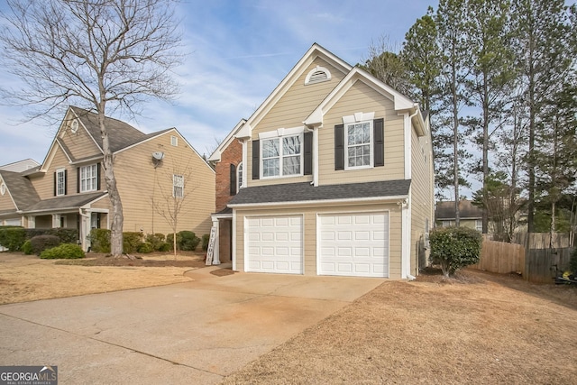 view of front of property with a garage