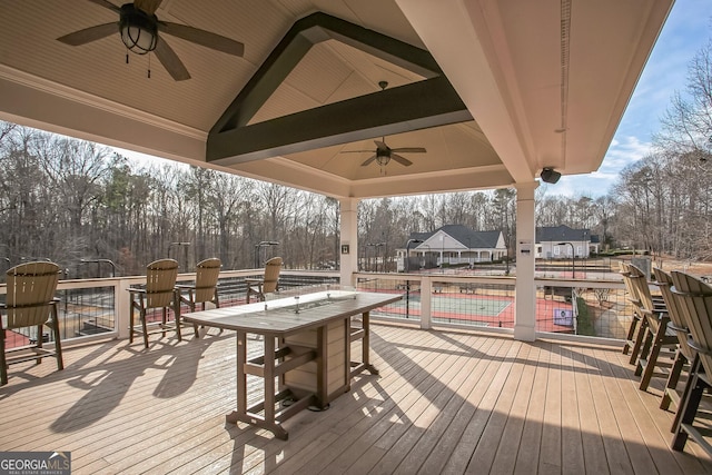 wooden deck featuring a gazebo and ceiling fan