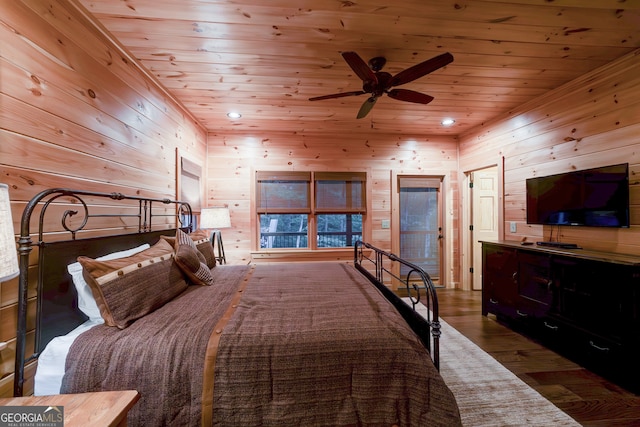 bedroom featuring wood ceiling, dark hardwood / wood-style flooring, and ceiling fan