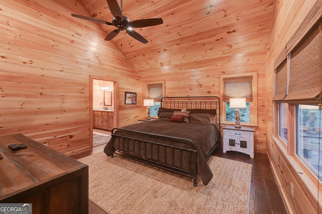 bedroom featuring hardwood / wood-style floors, high vaulted ceiling, ensuite bathroom, and ceiling fan