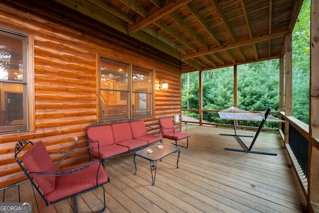 deck featuring outdoor lounge area