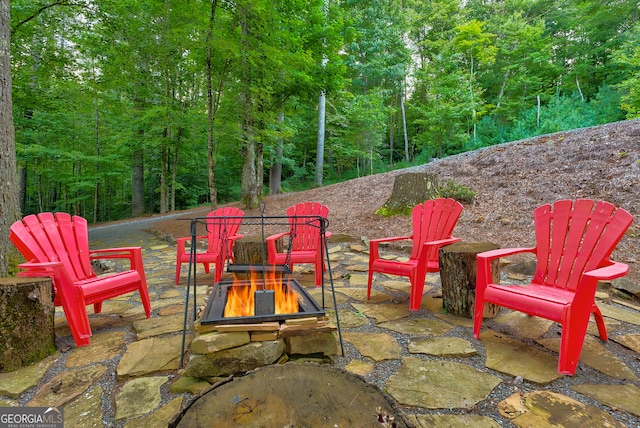 view of patio / terrace featuring a fire pit