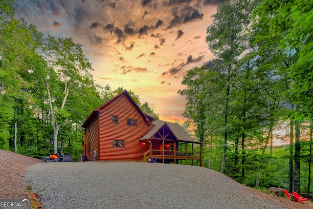 view of property exterior at dusk