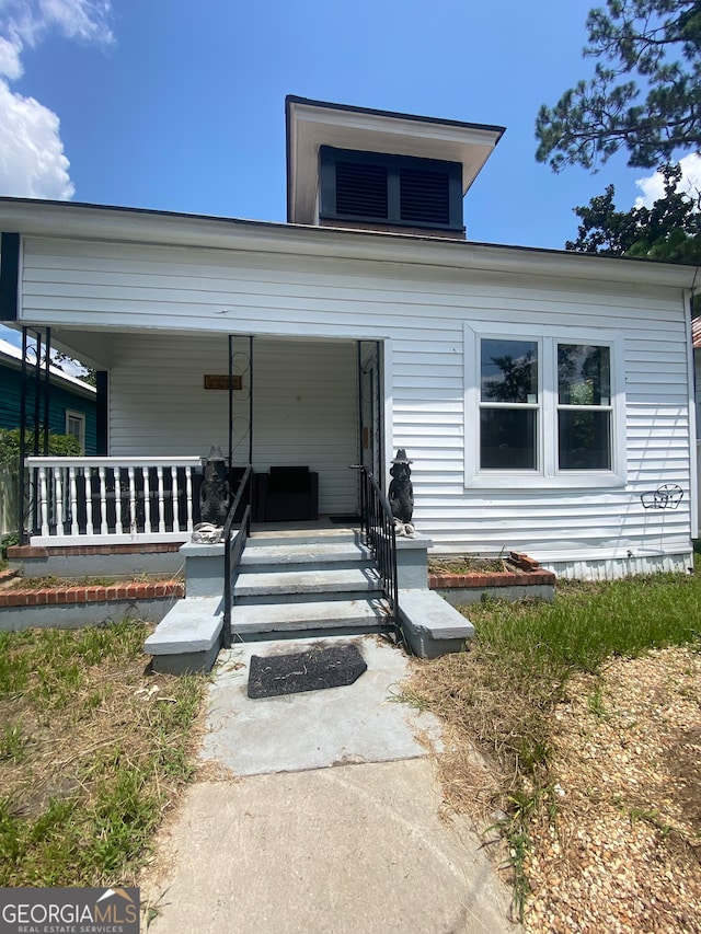 view of front of house featuring covered porch