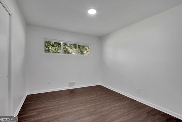 empty room featuring hardwood / wood-style floors