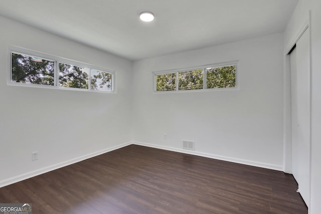 unfurnished bedroom featuring wood-type flooring