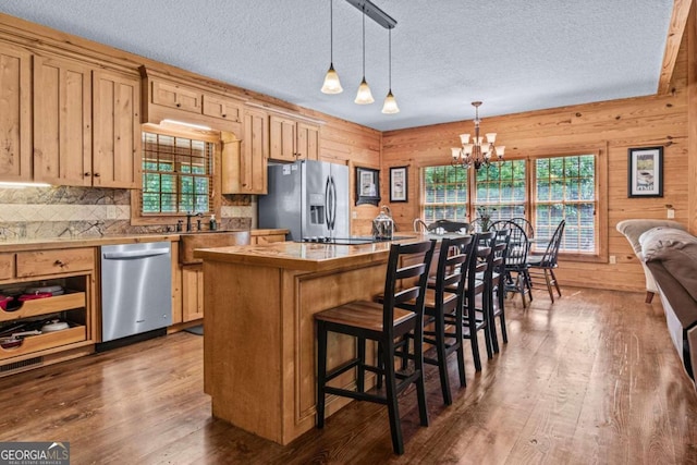 225 Big Oconee River Rd, Sparta, GA 31087 - kitchen with appliances with stainless steel finishes, dark wood finished floors, and a wealth of natural light