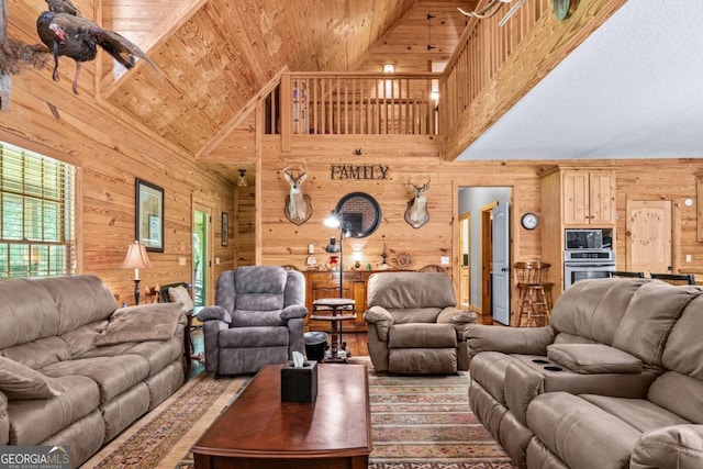 225 Big Oconee River Rd, Sparta, GA 31087 - living area featuring wood walls, wood ceiling, and high vaulted ceiling