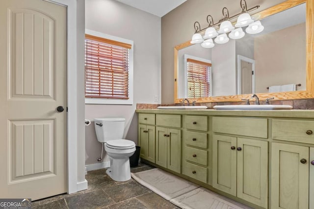 225 Big Oconee River Rd, Sparta, GA 31087 - full bath with toilet, a wealth of natural light, double vanity, and a sink