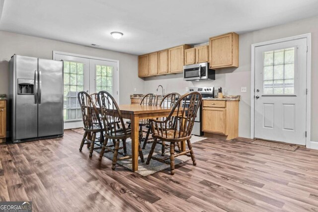 225 Big Oconee River Rd, Sparta, GA 31087 - dining room with french doors and wood finished floors