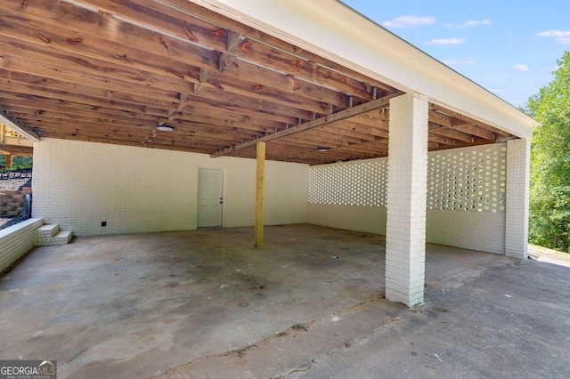 exterior space with a carport