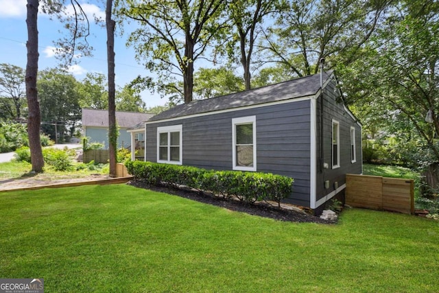 view of outdoor structure featuring a yard