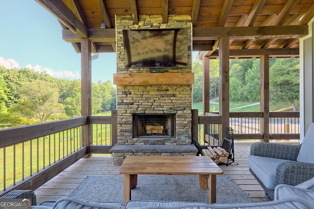 exterior space featuring an outdoor stone fireplace