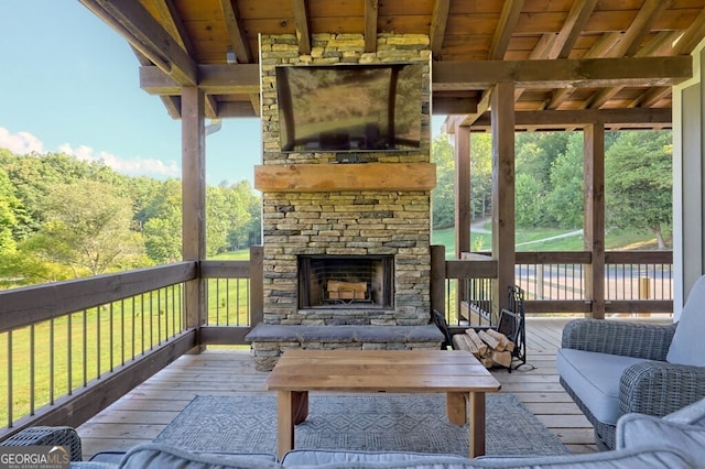 exterior space with an outdoor stone fireplace