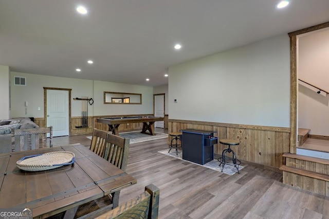 dining room featuring hardwood / wood-style floors and billiards