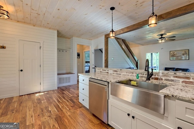 kitchen featuring white cabinets, dishwasher, wood-type flooring, sink, and wooden ceiling