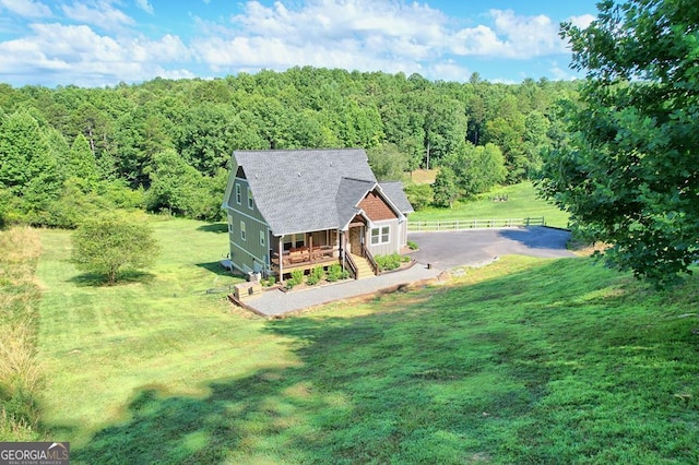 drone / aerial view with a forest view