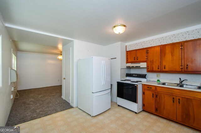 kitchen with decorative backsplash, sink, white appliances, and light tile patterned floors