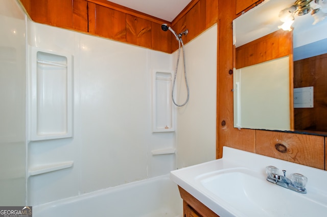 bathroom with shower / bathtub combination and vanity