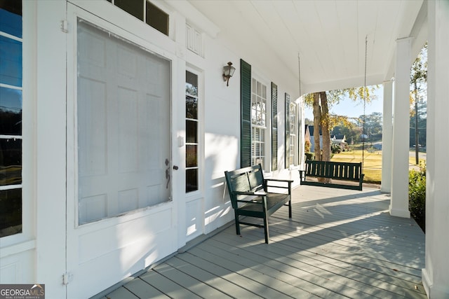 deck featuring a porch