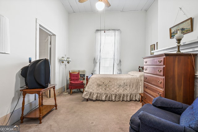 carpeted bedroom with ceiling fan and wooden ceiling