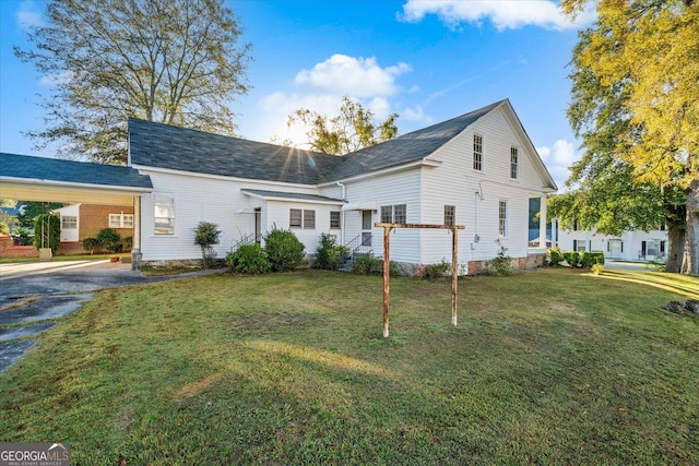211 Main St, Franklin, GA 30217 - traditional-style home featuring driveway, a front lawn, a carport, and a shingled roof