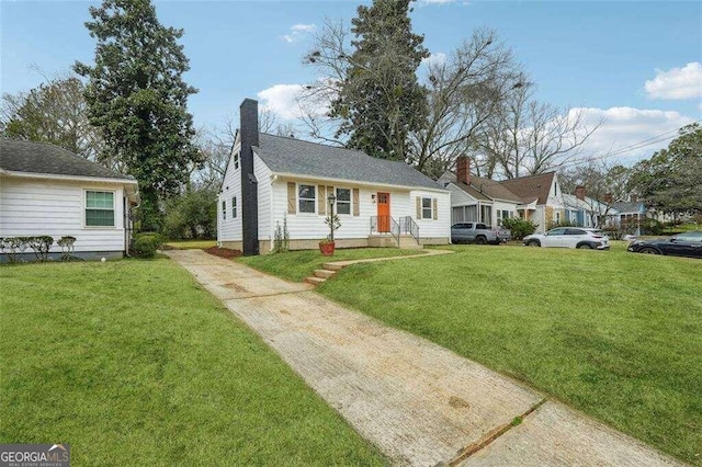 ranch-style home with a front lawn